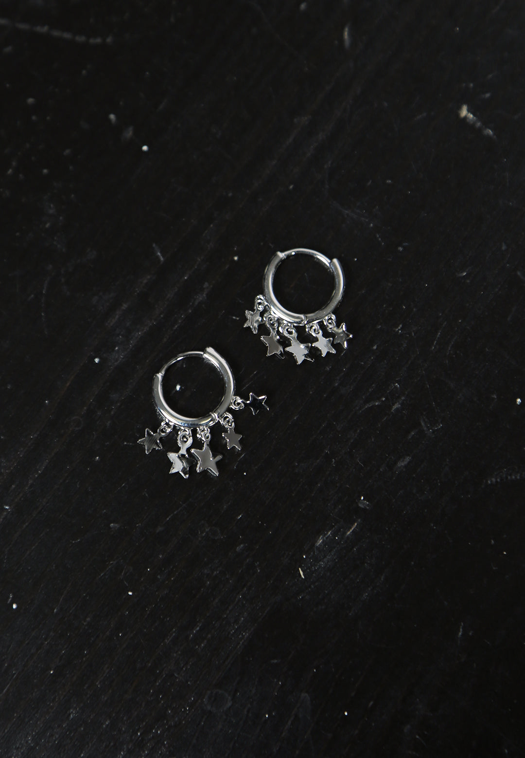 star cluster huggie earrings