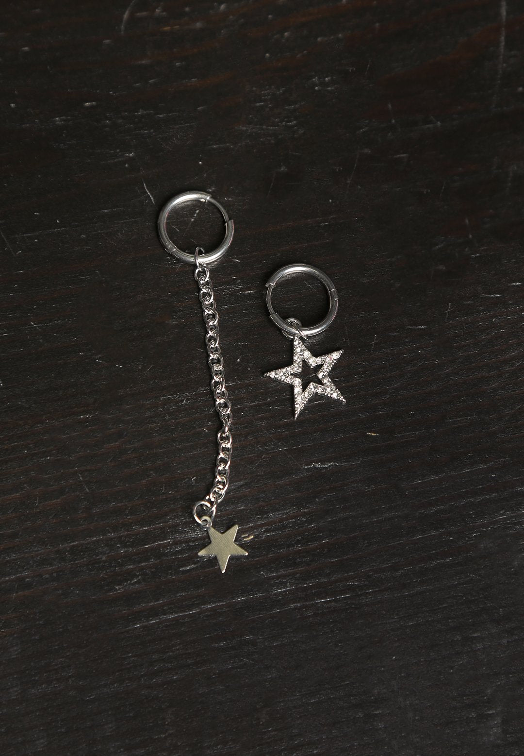 mismatched star earrings