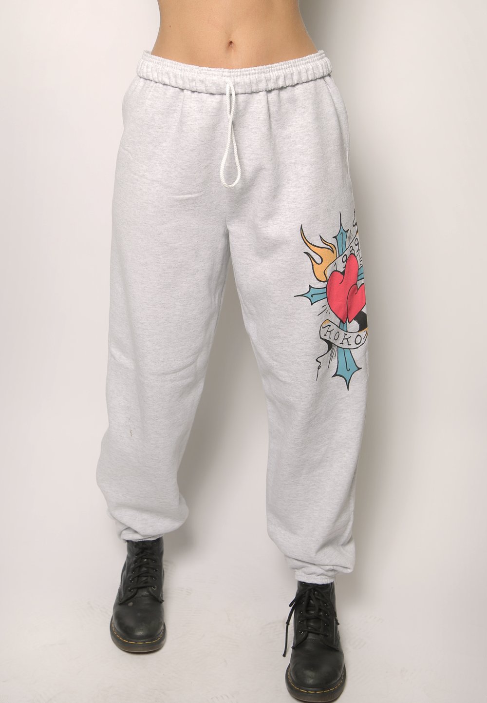 tattooed cross iamkoko.la original sweatpants